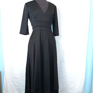 Classic Black Dress with Clean Lines and Stitching Detail
